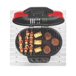 Coleman RoadTrip® 225 Portable Tabletop Propane Grill -Coleman 2000033047 coleman grills 225 TT heritage red flames turned on food on grates overhead 3